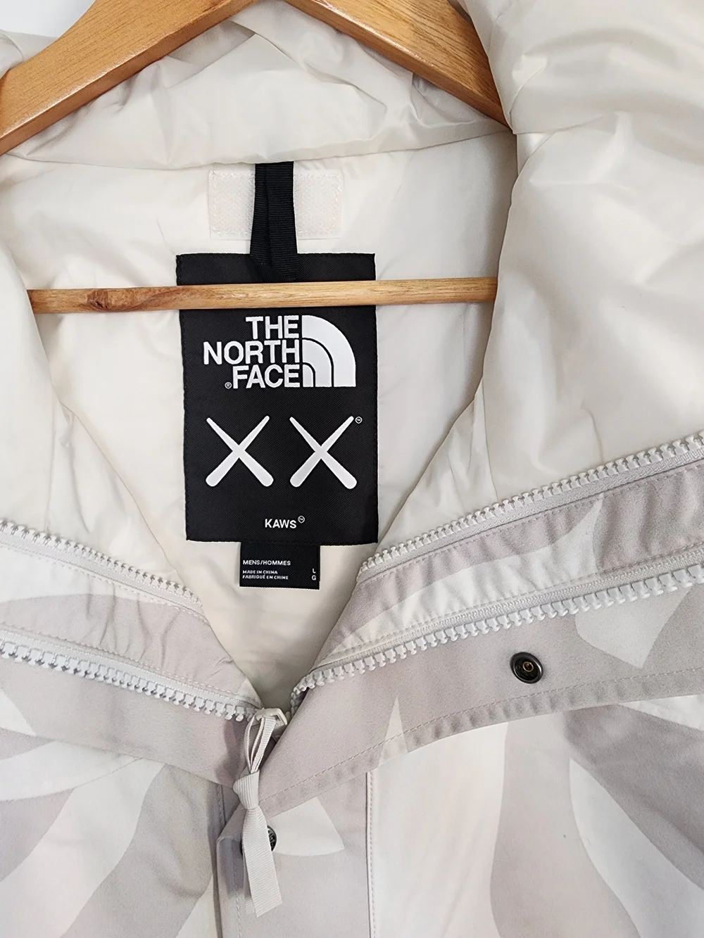 The North Face x KAWS 1986 Retro Mountain Jacket Moonlight Ivory Camo L